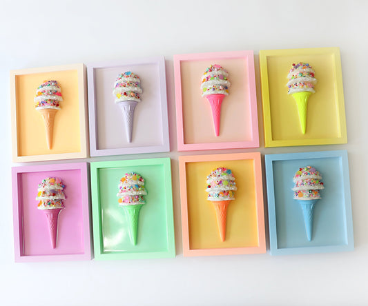 Modern pop-art style wall art with ice cream and candy motifs in bold colours.